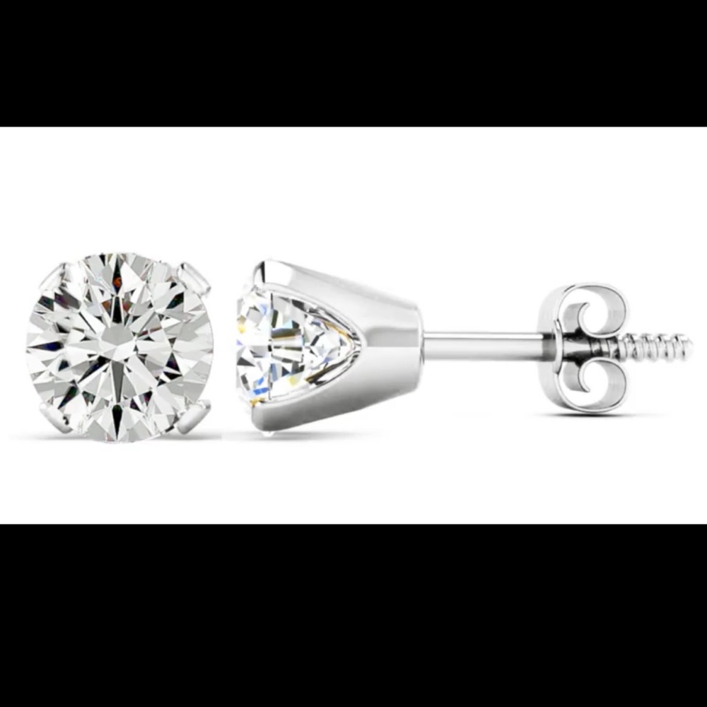 Brand new stud earrings in 14k white gold.